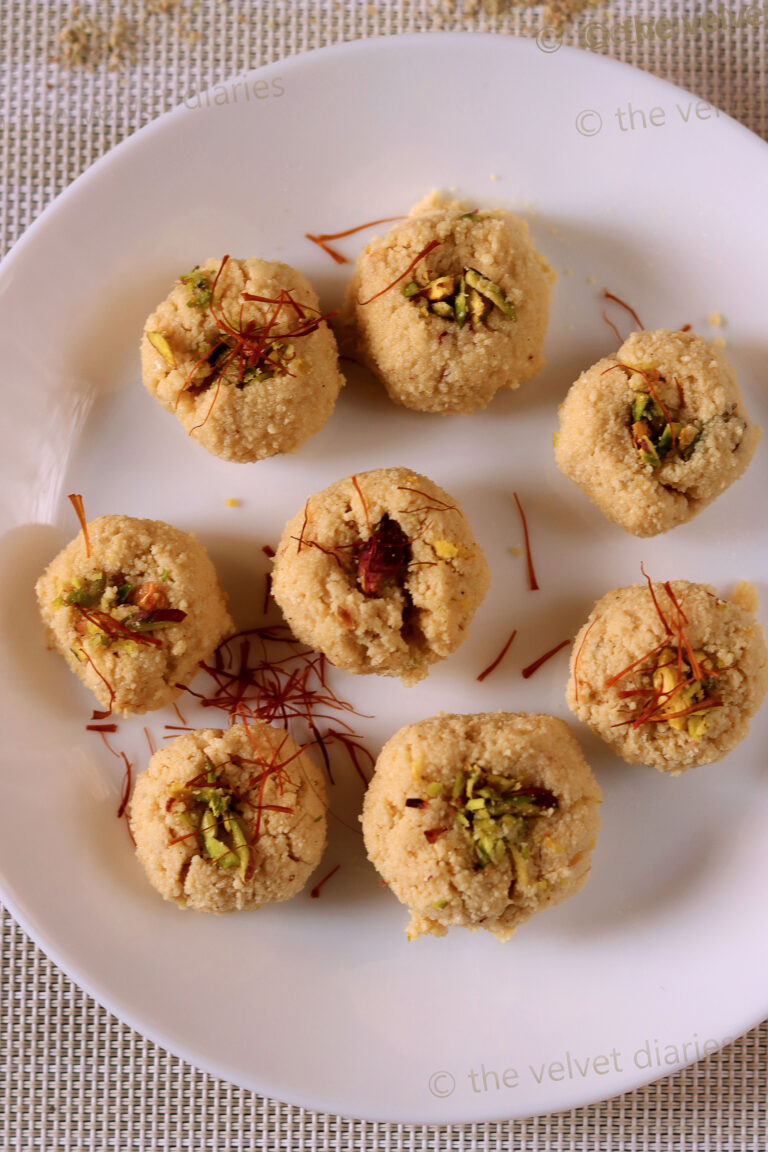 Mava Pedha sprinkled with crushed pistachios, adding a crunchy twist to the traditional sweet.