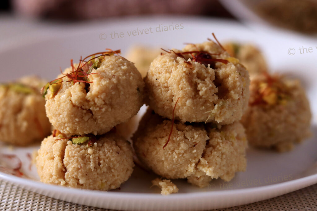 Close-up of a gourmet Pedha (indian desert) with fresh Mava and milk, captured with professional food photography lighting