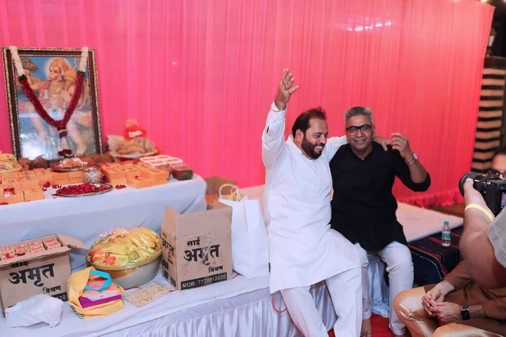 Regional leader interacting with event host during ceremony