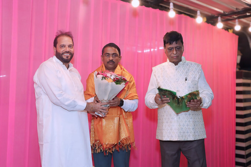 Regional leader interacting with event host during ceremony