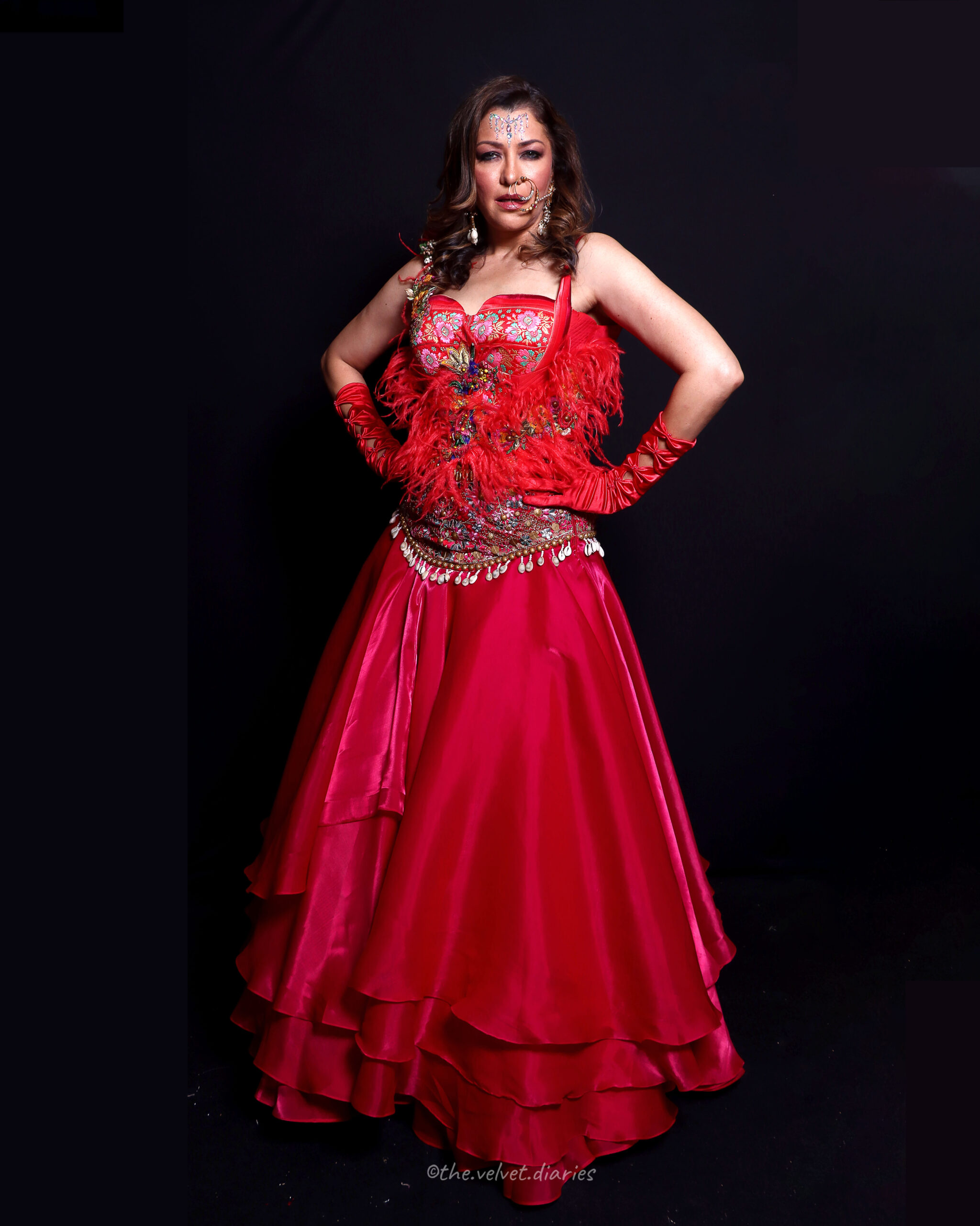 Aditi Govitrikar posing in front of Bombay Times Fashion Week branding, clicked by Mumbai celebrity photographer.