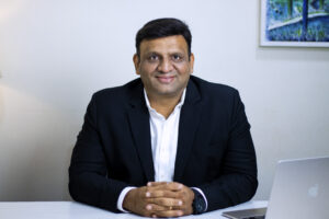 Professional business headshot for marketing materials by Mumbai-based photographer.