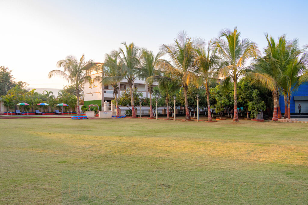 Lush green outdoor spaces photographed for resort marketing.