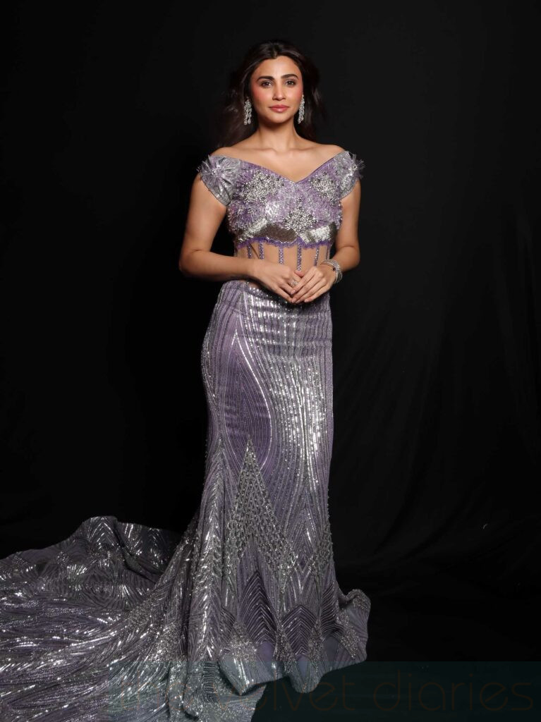 Daisy Shah captured during a live fashion show appearance