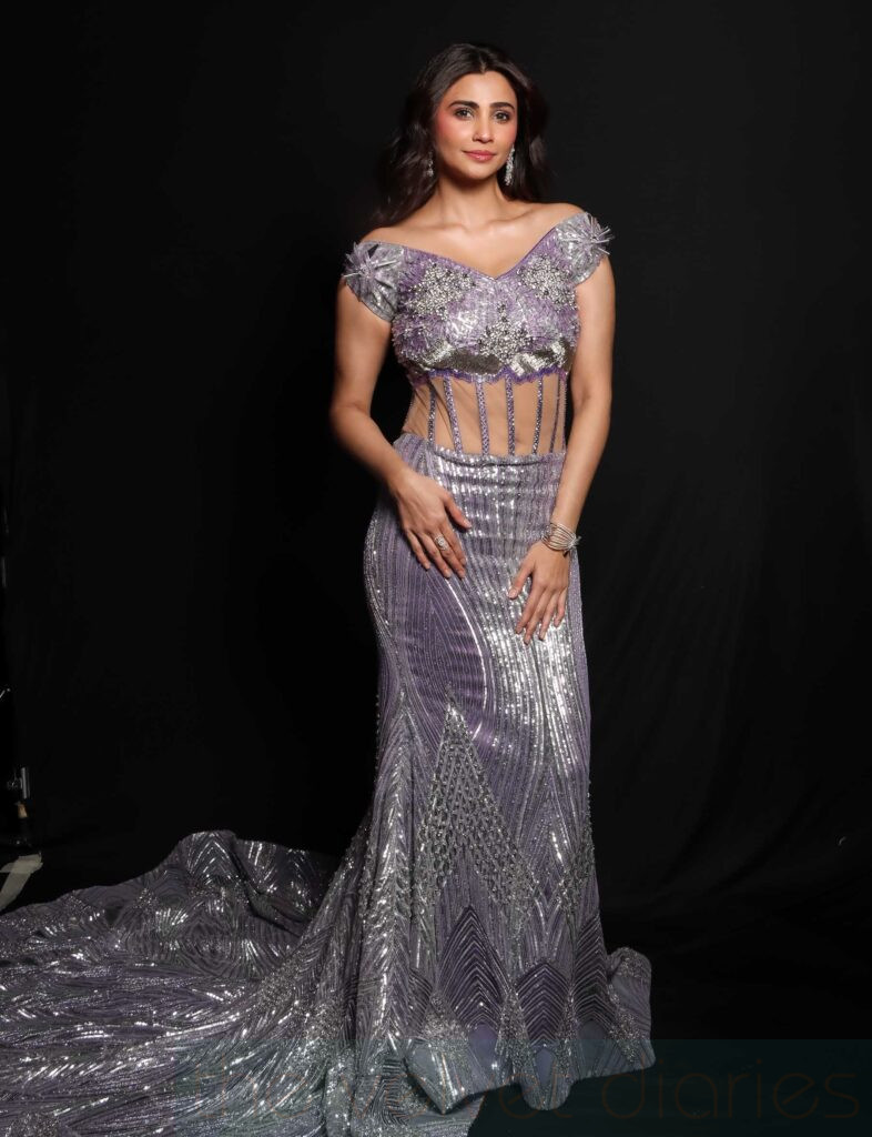 Celebrity presence captured during a fashion showcase