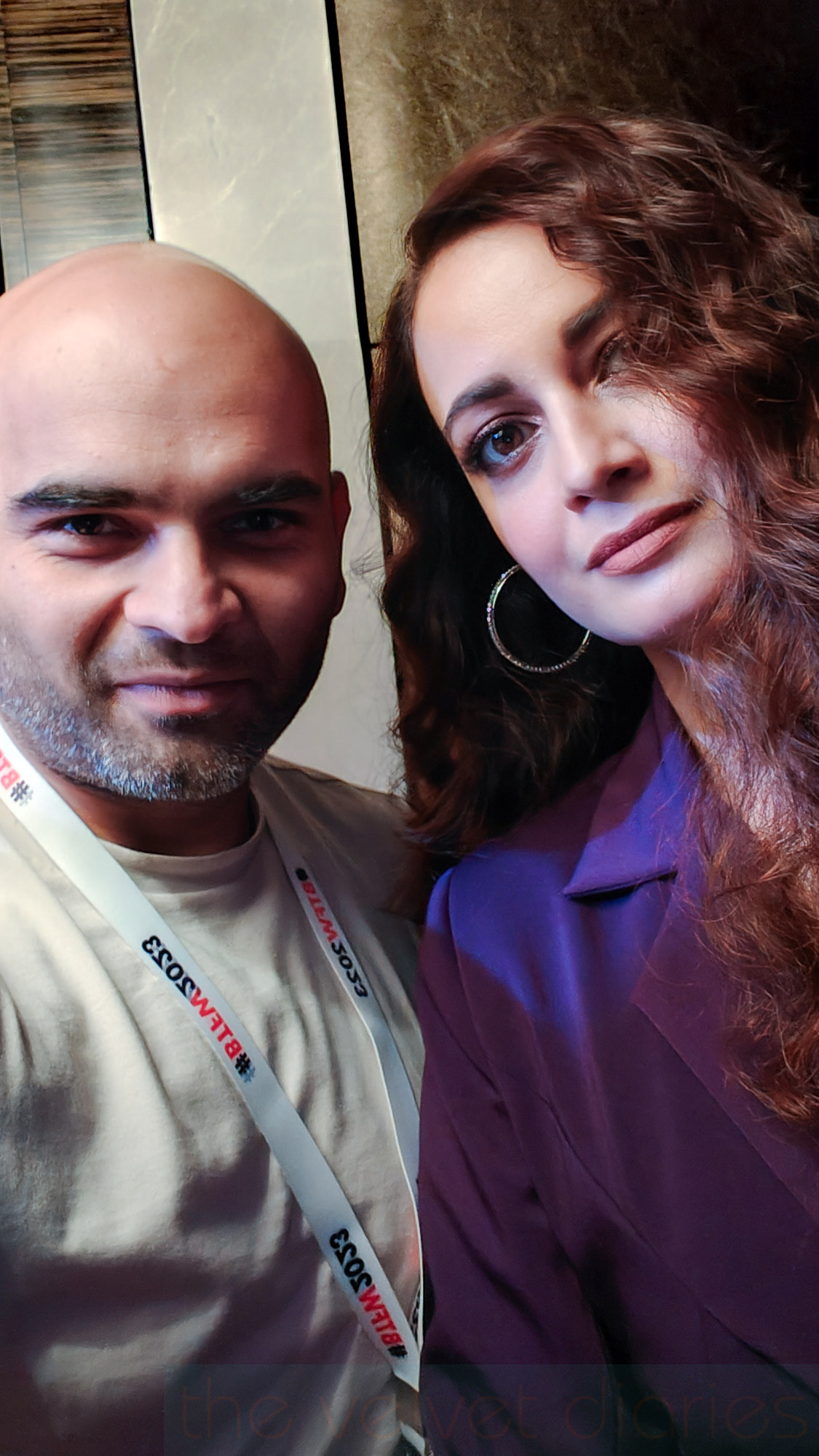 Photographer with Dia Mirza during fashion week event