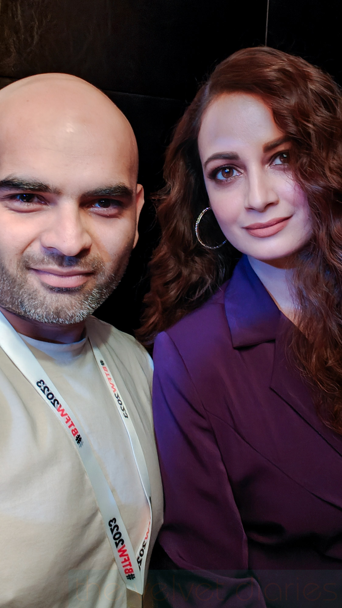 Behind-the-scenes moment with celebrity at fashion show