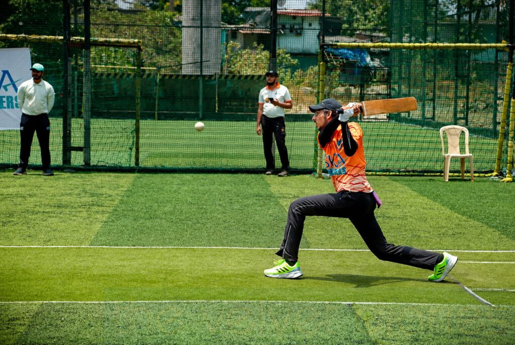 Corporate cricket tournament batting action captured during Mumbai business event