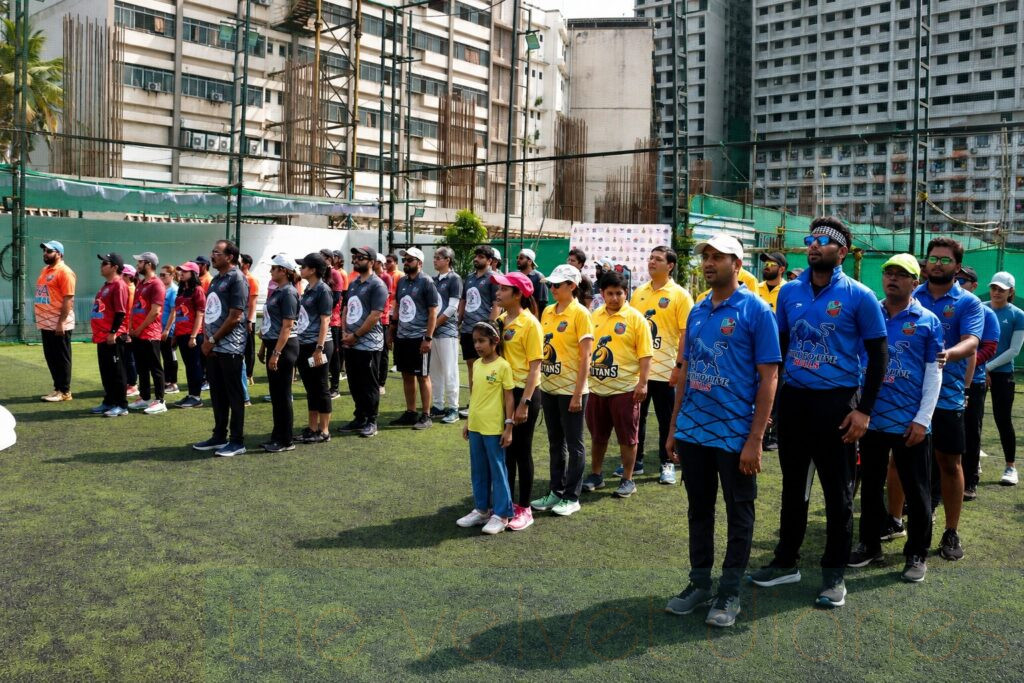 Corporate cricket tournament opening ceremony with team lineup in Mumbai