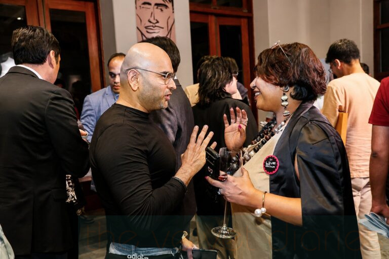 Professionals networking during premium Mumbai business event