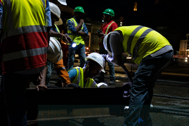 Engineering process photography showing workers during metro rail infrastructure activity