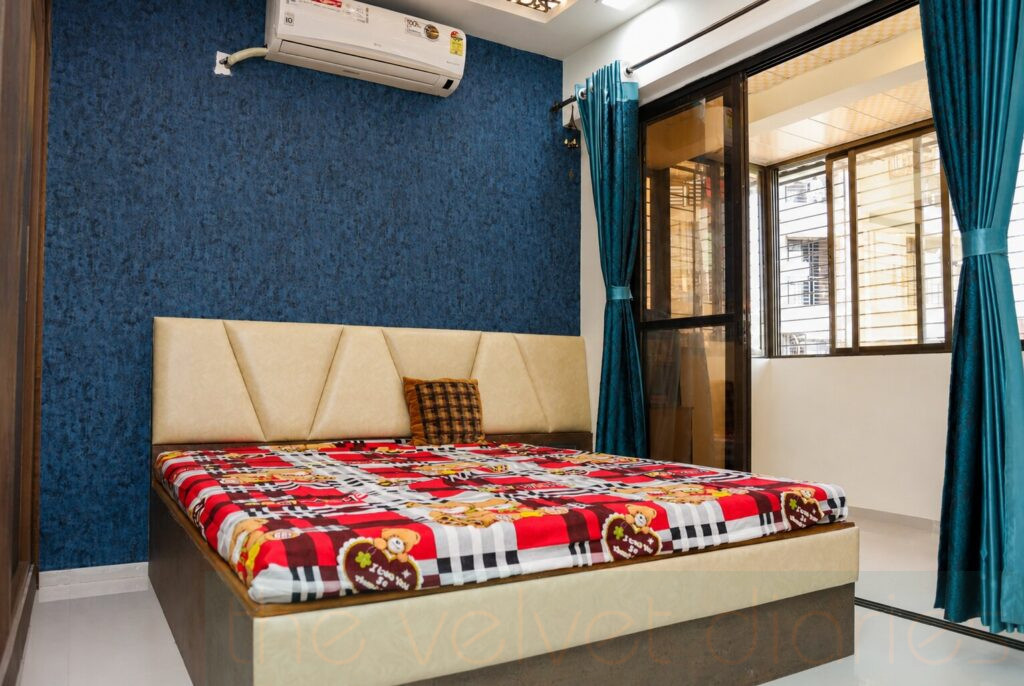 Modern bedroom interior with textured wall design photographed for residential interior portfolio in Mumbai & Navi Mumbai