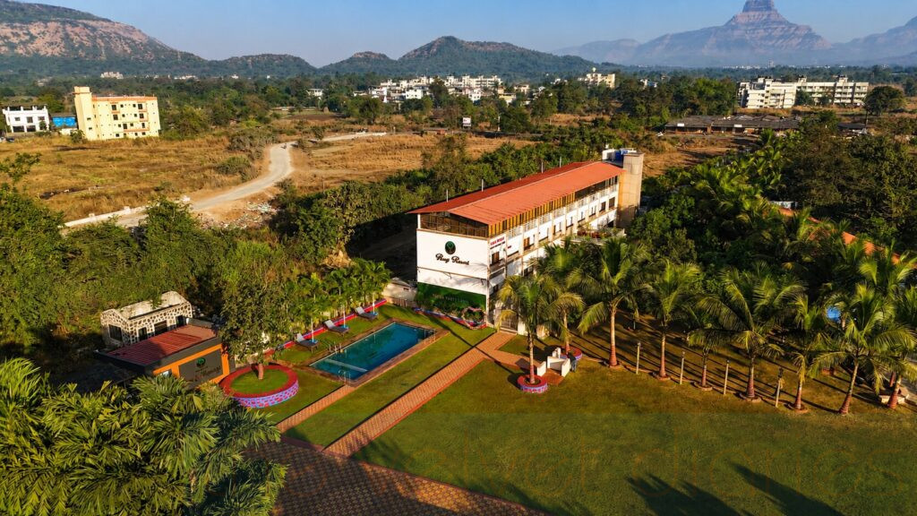 Drone aerial photograph of hospitality resort architecture and commercial property environment near Mumbai