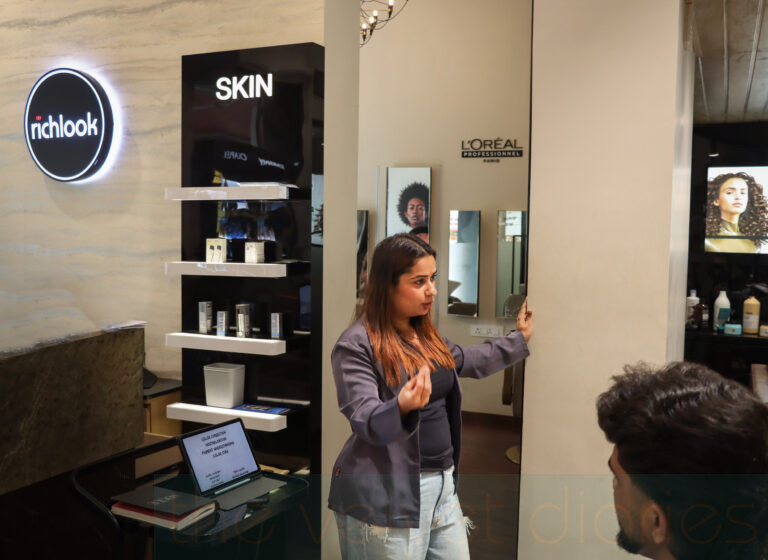 Hair stylist educator Priya Tekchandani from White Feather Studio, Mumbai delivering a professional business presentation inside a premium salon during a branding photography session in Mumbai.