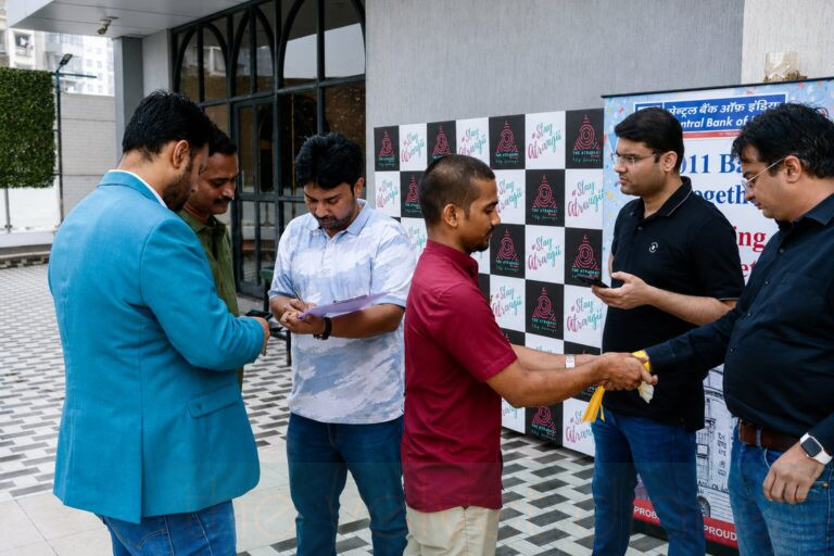 Corporate event registration and guest welcome area photographed during a business networking event in Lower Parel, Mumbai by The Velvet Diaries.
