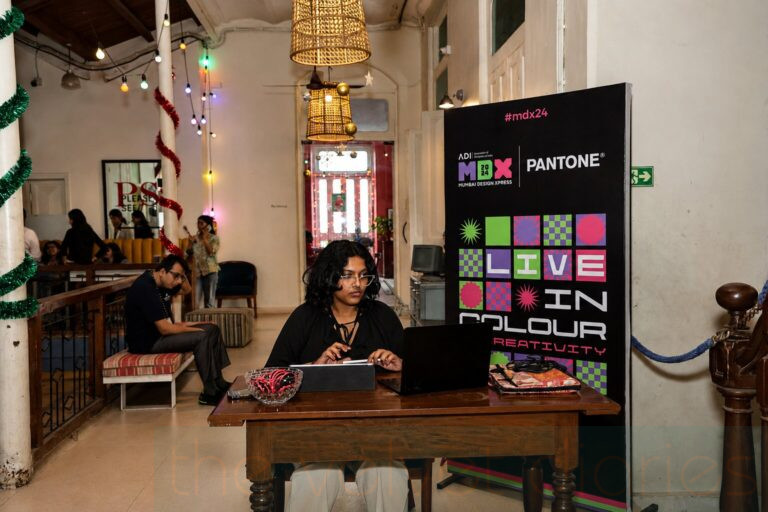 Professional event registration desk photography capturing attendee experience and corporate branding at a business event in Mumbai.