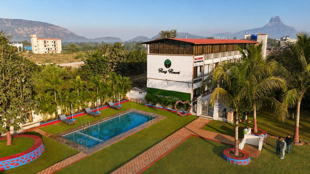 Aerial drone photograph of a resort property and landscaped surroundings captured for hospitality marketing in Panvel, Mumbai.