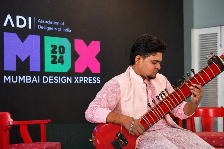 Live musician performing at a Mumbai design event photographed by a corporate event photographer