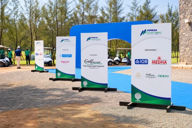 Corporate branding photography in Mumbai featuring MMRDA Future Connect Invitational Golf sponsor signboards and event entrance displays.