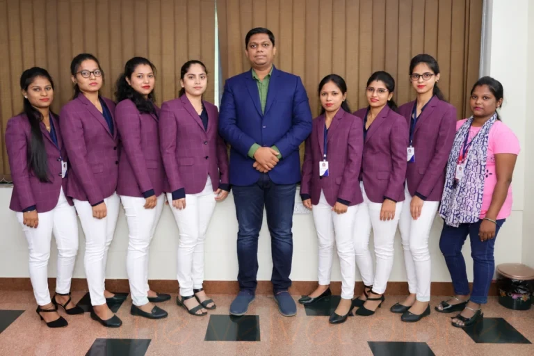 Corporate team photography in Mumbai featuring a professionally dressed female team with their manager for business branding.